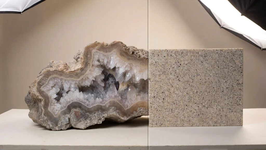 Editorial comparison of engineered quartz and natural quartzite surfaces, highlighting uniform manufactured patterns versus crystalline geological depth.